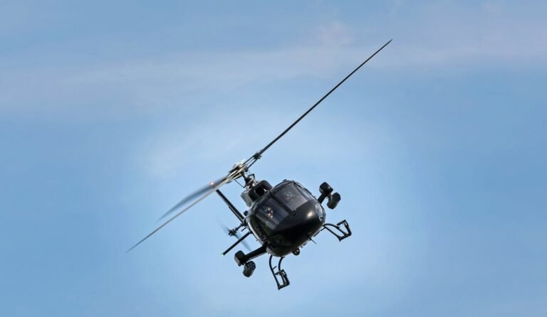 A helicopter flying in the sky during a tour of Dubai.