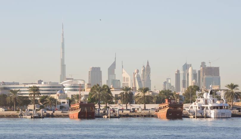 Skyline of Dubai seen from the water at Dubai Creek.