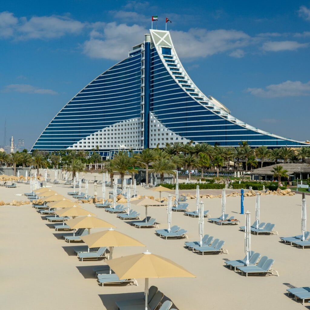 Jumeirah Beach scene with multiple chairs and umbrellas.