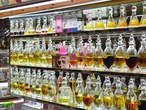 Assorted perfume bottles and items on display at Dubai's Perfume Souk.