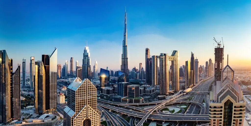 Dubai skyline at sunset with Burj Khalifa standing tall in the background