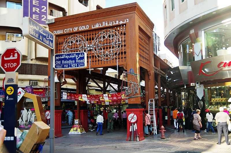 Crowded Dubai street with shoppers at Electronics Souk.