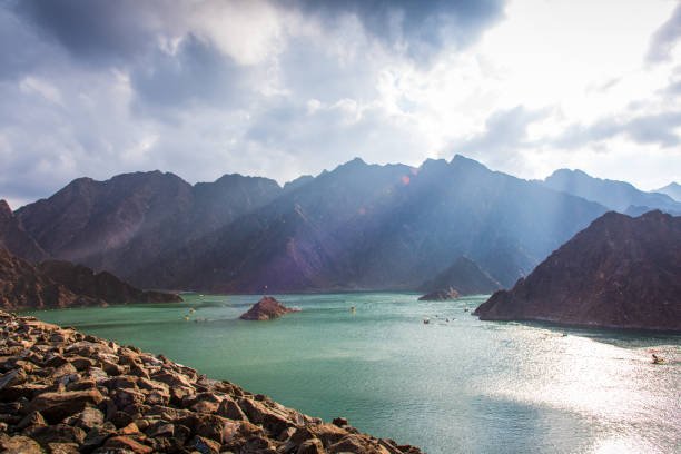 Hatta dam lake landscape in Dubai emirate of UAE at sunset