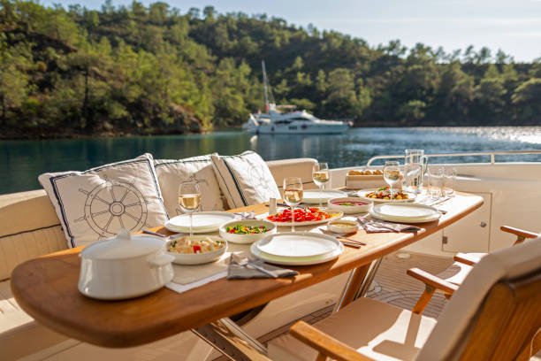 Romantic Dinner on Motor Yacht at Sunset, Table Setting at a Luxury Yacht.