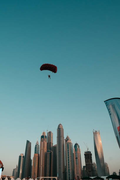 Dubai Marina skyline and Skydive Dubai - fun parachuting and activities in the city
- Dubai, UAE, March 6, 2020