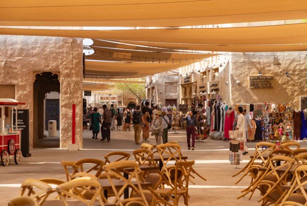 A picture of traditional shops at the Al Seef cultural and shopping complex.