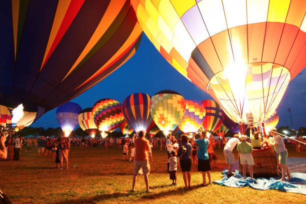 Baton Rouge, Louisiana, USA - 2010: People prepare for the glowing of the balloons at the annual Hot Air Balloon Festival