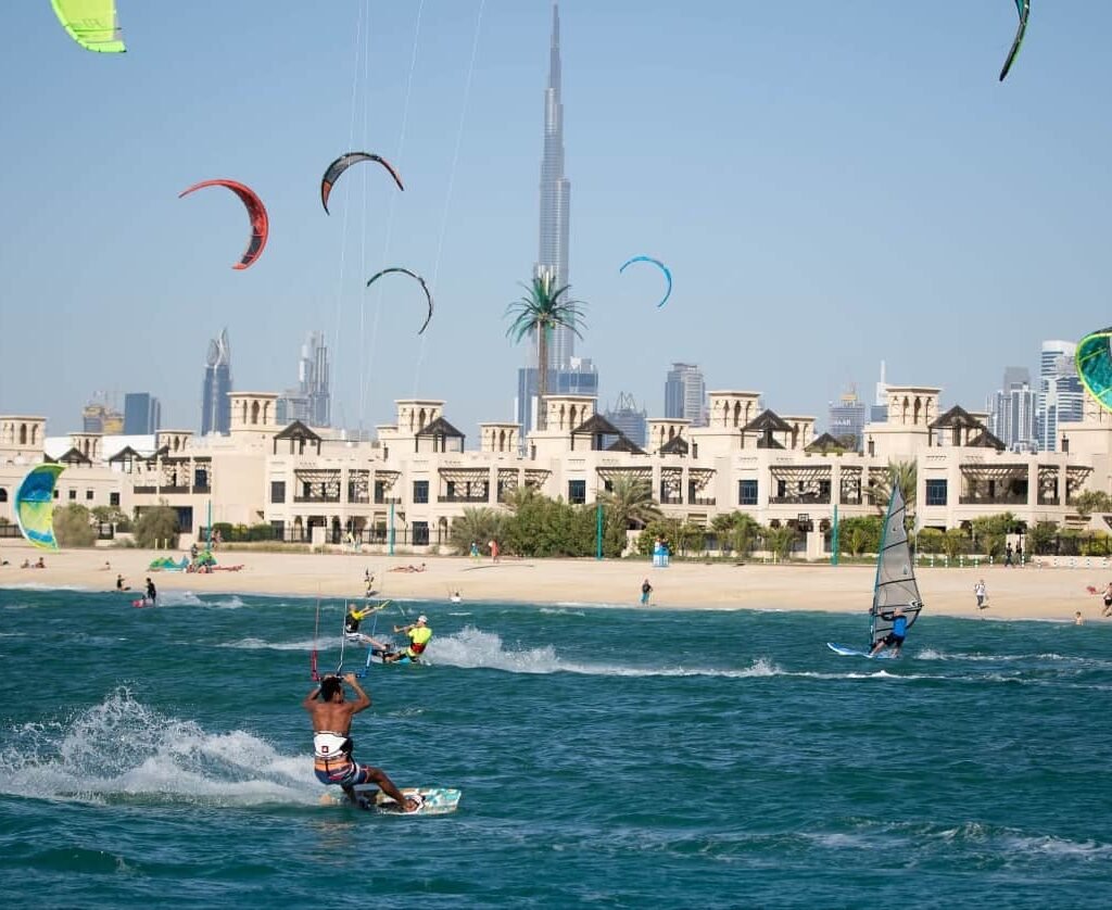 Kite surfer enjoying the waves at Dubai's Kite Beach.