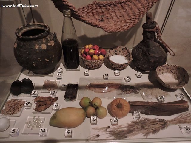 Food and artifacts exhibit at Sharjah Heritage Museum showcasing traditional Emirati cuisine and cultural items.